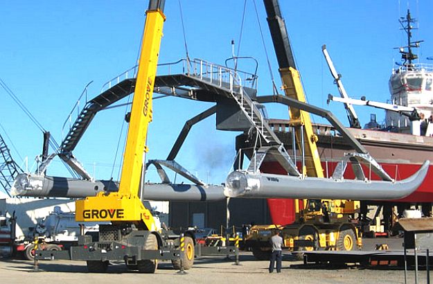 Proteus being crane loaded on the dock