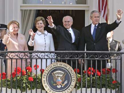 White House meeting from left to right: Australian Prime Minister John Howard's wife Janette Howard, Laura Bush, John Howard, and George W. Bush