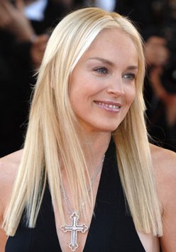 Sharon Stone blonde bombshell wearing cross