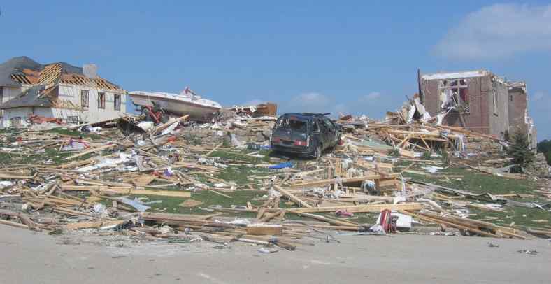 Tornado EF3 damage - roof and some inner walls of brick building have been demolished