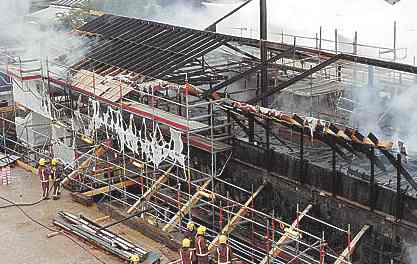 Cutty Sark emergency fire services crew survey damage