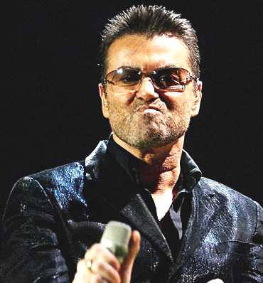 George Michael in blue jacket